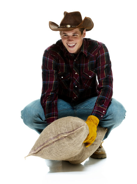 兴高采烈的农民拿着粗麻袋图片下载