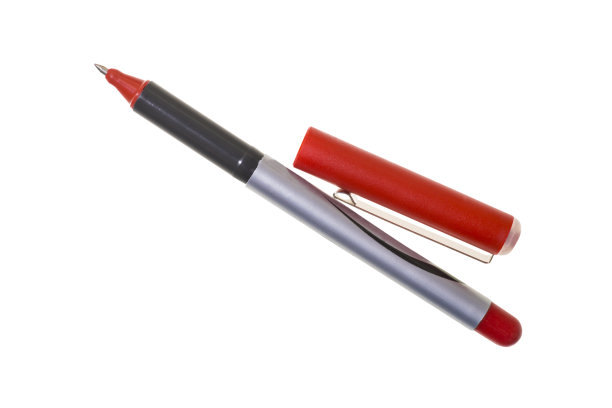 学校和办公用品:白色背景上的红笔图片下载
