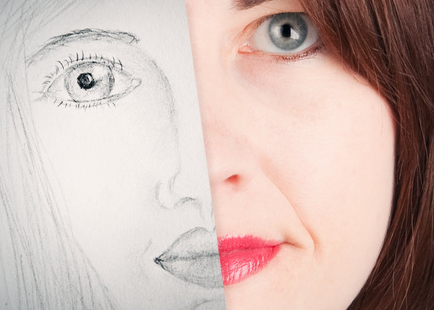 一个女人用素描遮住了她的半张脸图片下载