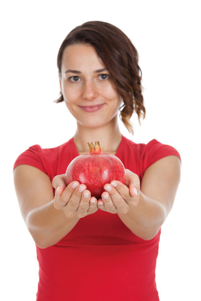 与石榴摆姿势的女孩图片下载