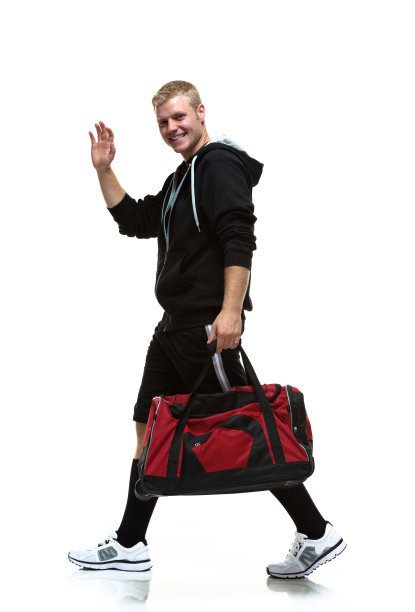 学生微笑着挥手走着图片下载