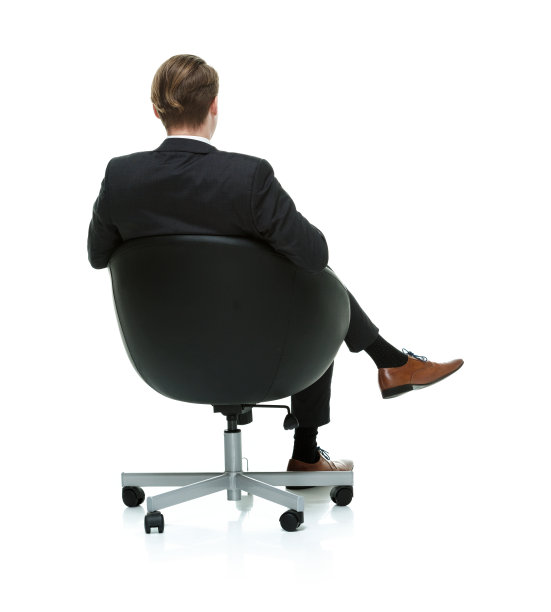 商人坐在椅子上的后视图图片下载