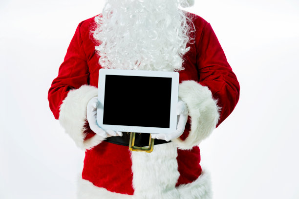 圣诞老人展示数码平板电脑图片下载