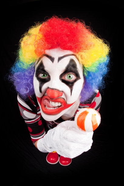 鱼眼小丑拿着棒棒糖图片下载