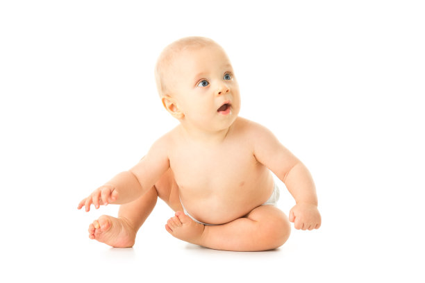 小婴儿孤立地坐在白色上图片下载