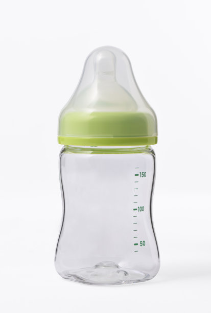 白色背景上的空奶瓶的孤立镜头图片下载