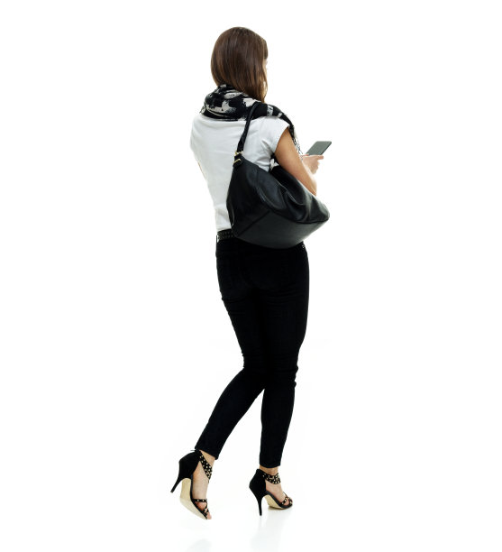 女人使用手机的后视图图片下载