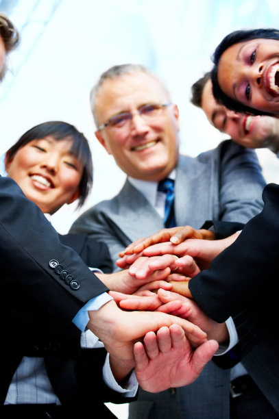 商业人士的双手堆叠图片下载