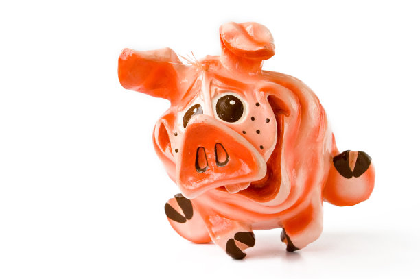 粉红色的小猪玩具在白色的上面图片下载