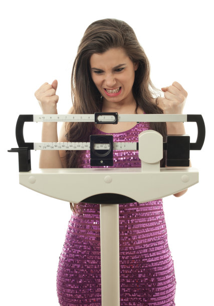 磅秤上的愤怒图片下载