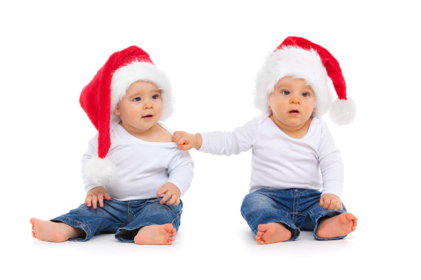 戴圣诞帽的双胞胎图片下载