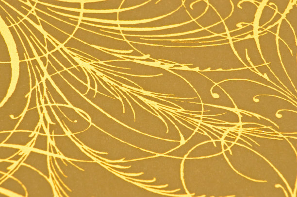 金纸背景与金属漩涡图片下载