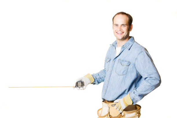 木匠持有卷尺与拷贝空间图片下载
