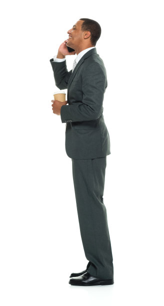 微笑着用手机聊天的商人图片下载