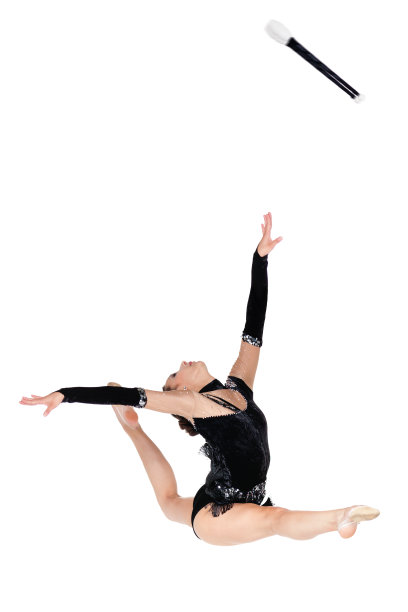 女孩跳跃与艺术运动体操俱乐部图片下载