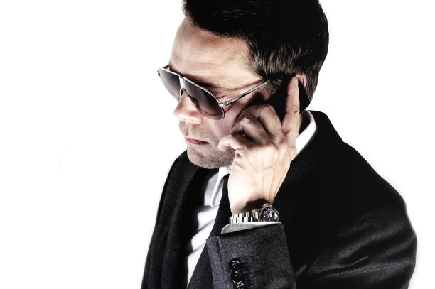 移动电话上的商人图片下载