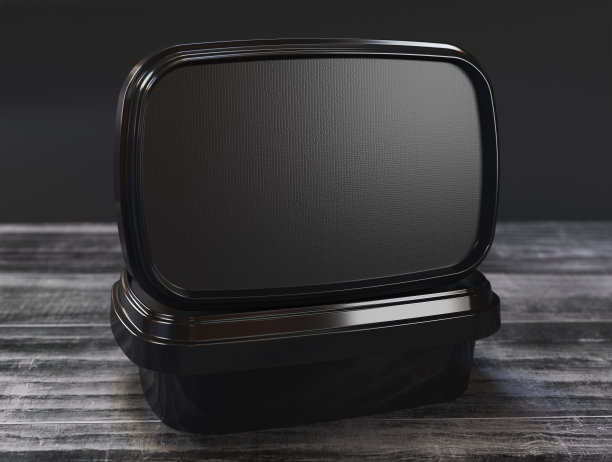 冰淇淋容器放在木桌上图片下载