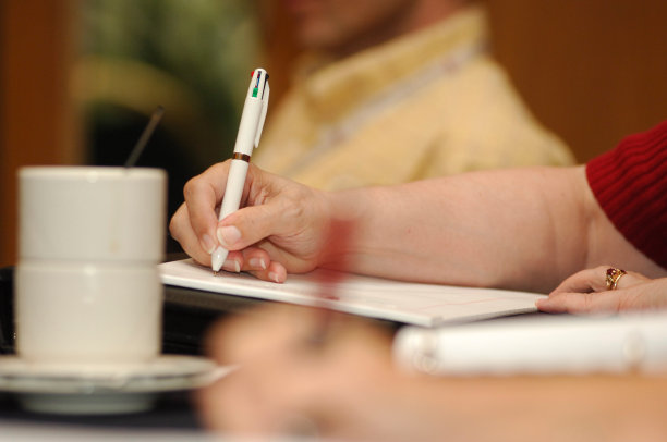 在商务会议上做笔记。图片下载