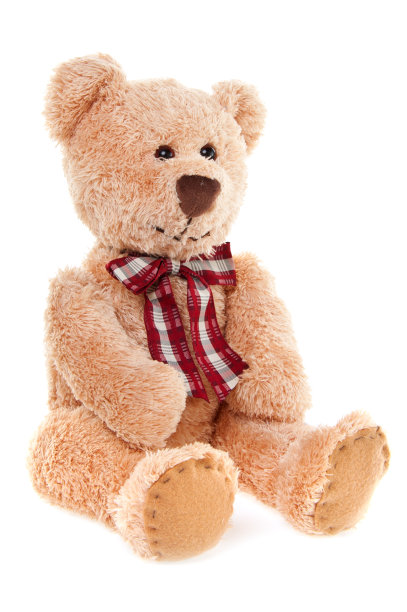 可爱的泰迪熊玩具坐着，孤立的白色图片下载