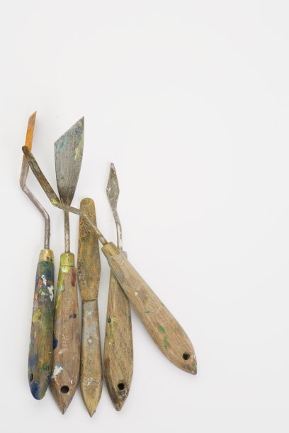 很好的使用调色板刀在白色表面与复制空间图片下载