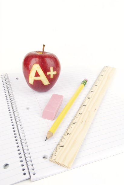 学校用品和老师的宠物苹果图片下载