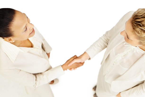 商界女性握手的俯视图图片下载