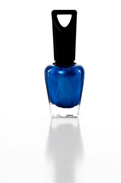 瓶子蓝色指甲油孤立白色图片下载