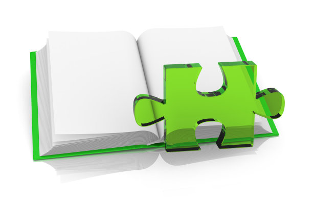 绿色拼图和打开的书图片下载