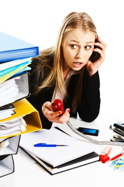 一心多用太疯狂:超负荷工作让女商人苦恼图片下载