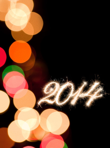 2014年新年的设计闪耀着散焦光图片下载
