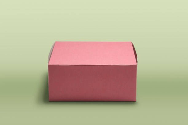 绿色背景上的粉色甜甜圈盒图片下载