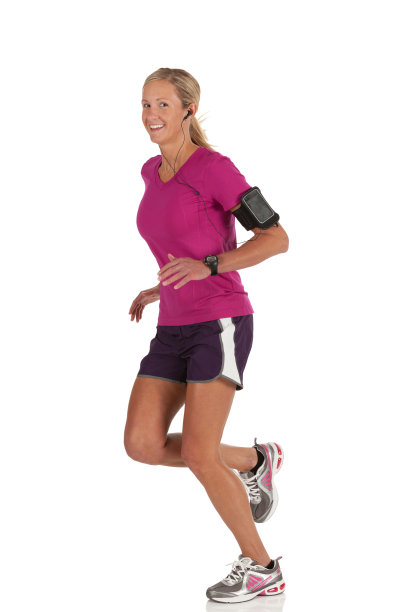 一个快乐的女运动员慢跑的肖像图片下载