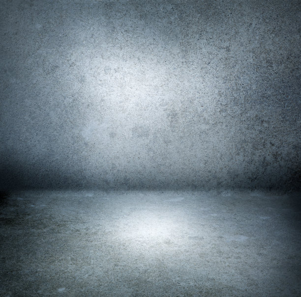灰色背景和灯光在中心图片下载