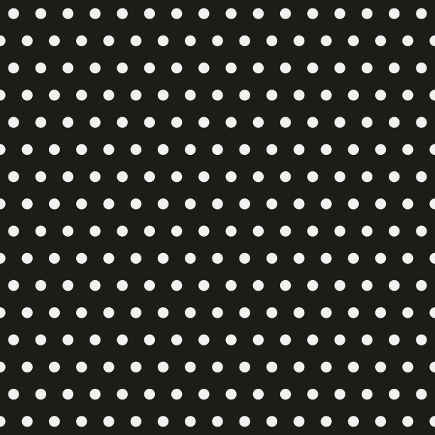 无缝圆点图案在黑纸上素材图片