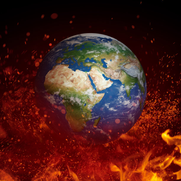 在黑色背景中，被隔离在火中的地球平面图片下载