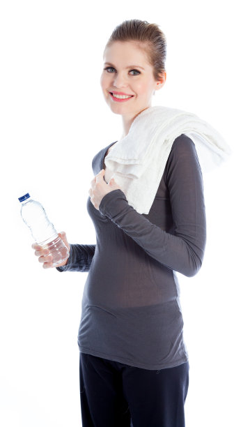 迷人的女人在瑜伽服孤立在白色的背景图片下载