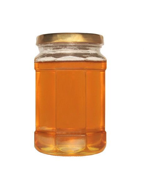 白色背景下的蜂蜜罐图片下载