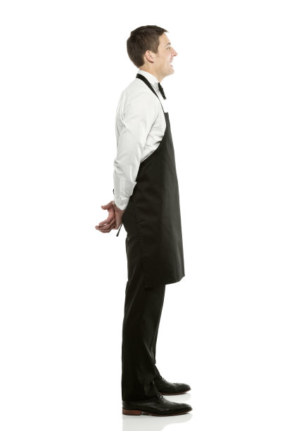 一个年轻的服务员站在白色的侧视图图片下载