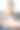 骄傲的父亲带着女儿坐在家里的沙发上。图片下载