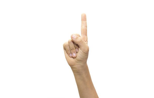 孩子在白色的背景上举起食指图片下载