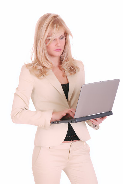 拥有笔记本电脑的年轻女商人图片下载