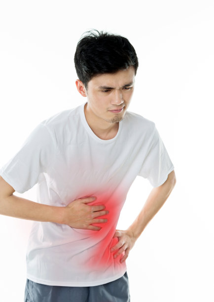 年轻的亚洲人胃痛图片下载