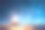 点燃蜡烛散焦蓝色背景-圣诞茶灯素材图片