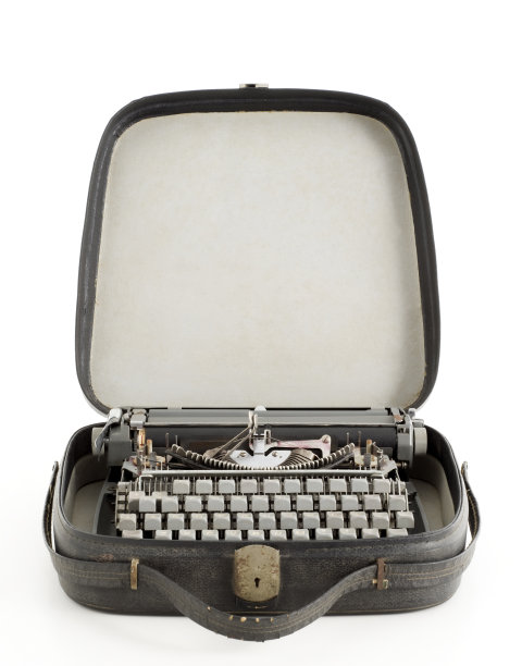 他公文包里的旧手提打字机图片下载