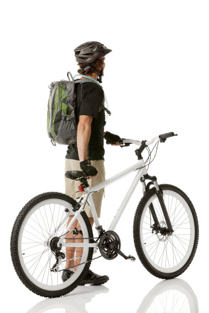 骑自行车的人和他的自行车站在一起图片下载