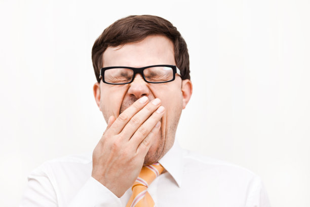 商人打呵欠图片下载