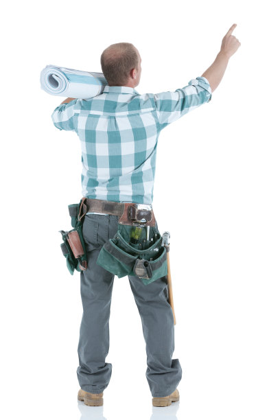 木匠拿着蓝图并指点图片下载