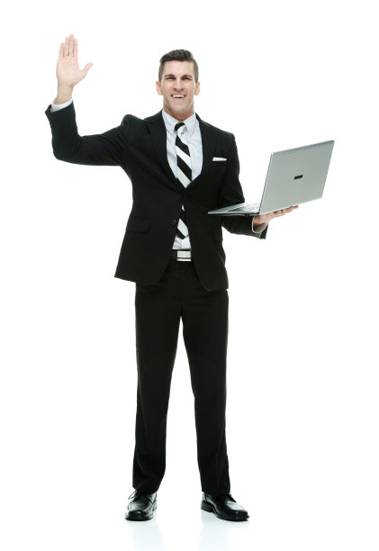 微笑的商人挥舞着手提电脑图片下载
