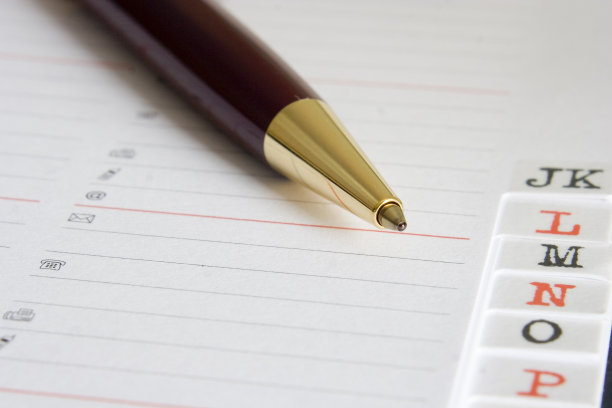 通讯录和钢笔特写图片下载