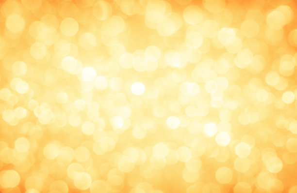 金色闪光散焦灯圣诞抽象背景图片下载